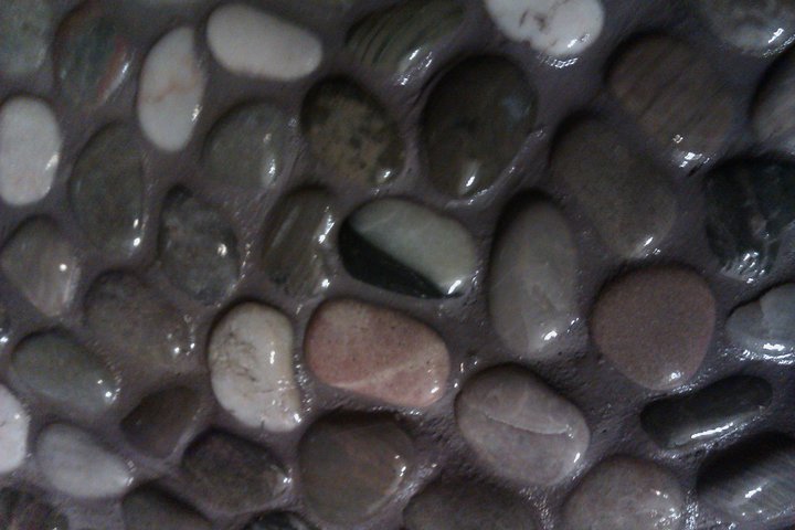 freshly grouted pebble shower floor in york, pa