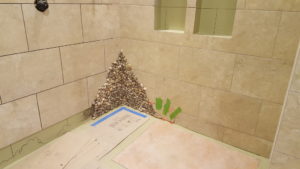 custom pebble installation in tile shower, harrisburg, Pa